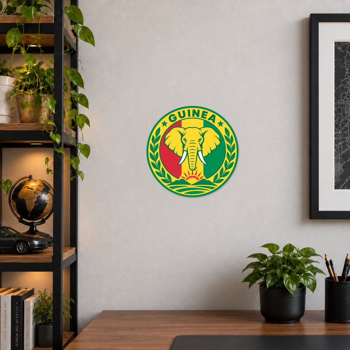Guinea 3D-printed country seal displayed on a home office wall at approximately 9.5 inches across