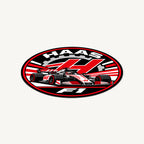 Haas F1 Team Seal — angled view showing the thin plaque profile; illustrative rendering
