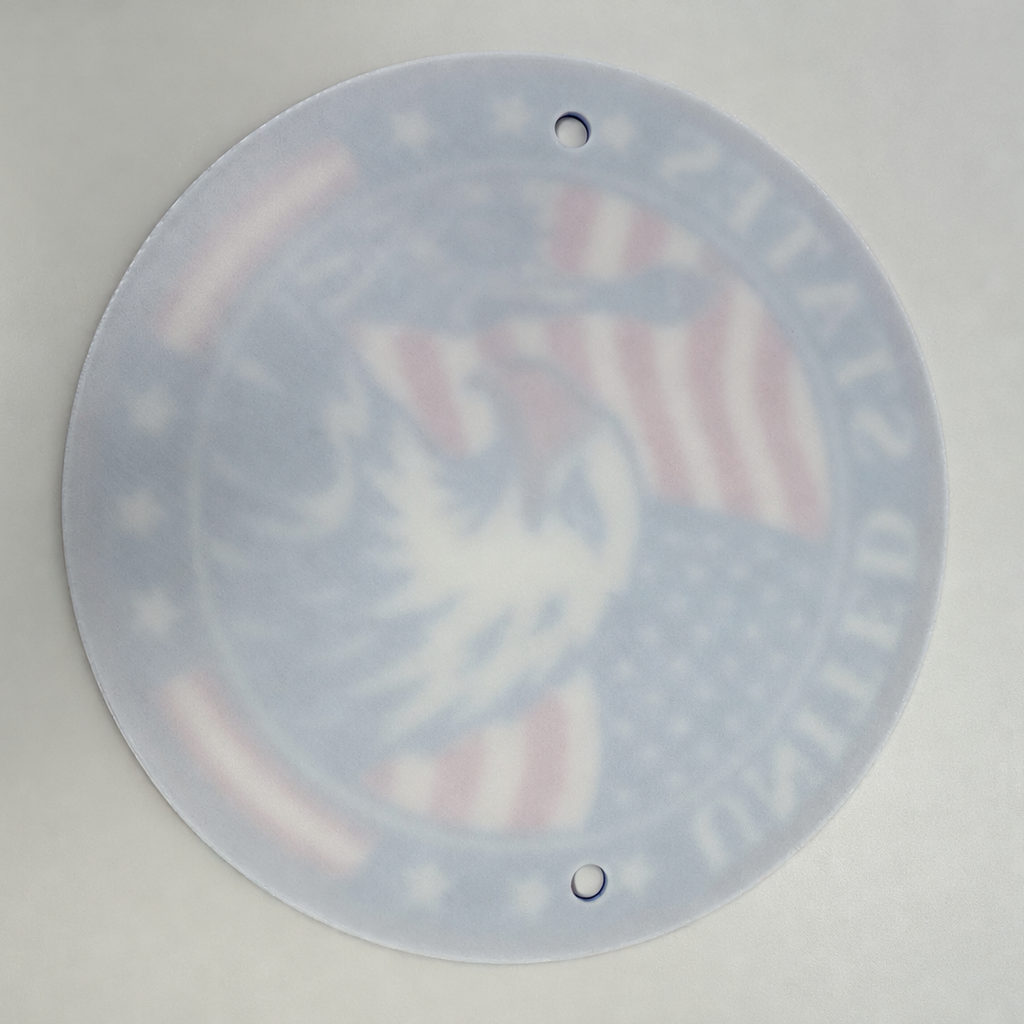 Back photograph of the 9.5-inch United States seal showing its backing and two hanging holes