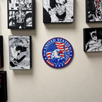 9.5-inch United States seal displayed among other artwork on a wall; mounting supplies and surrounding artwork are not included